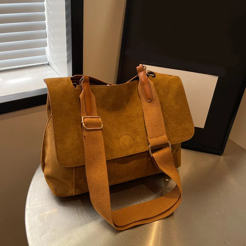 Suede bag with retro design