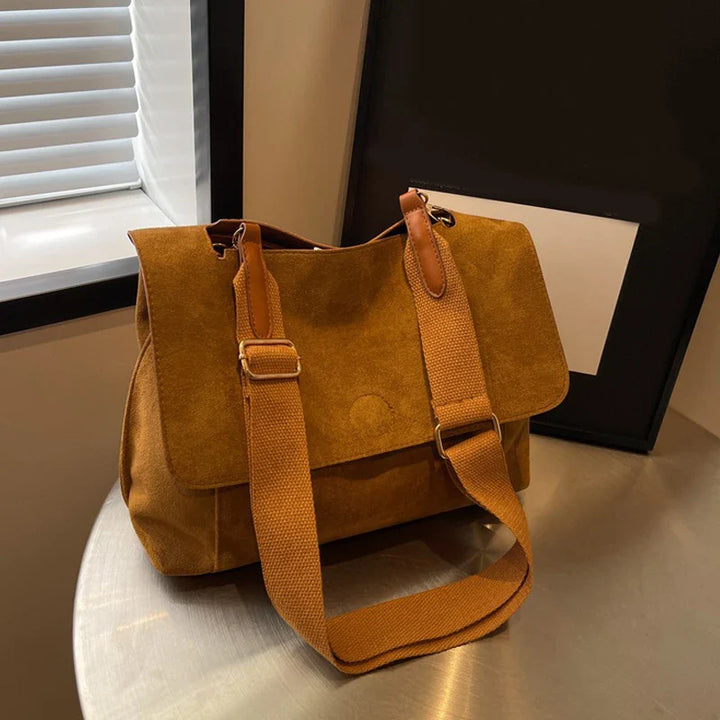 Suede bag with retro design