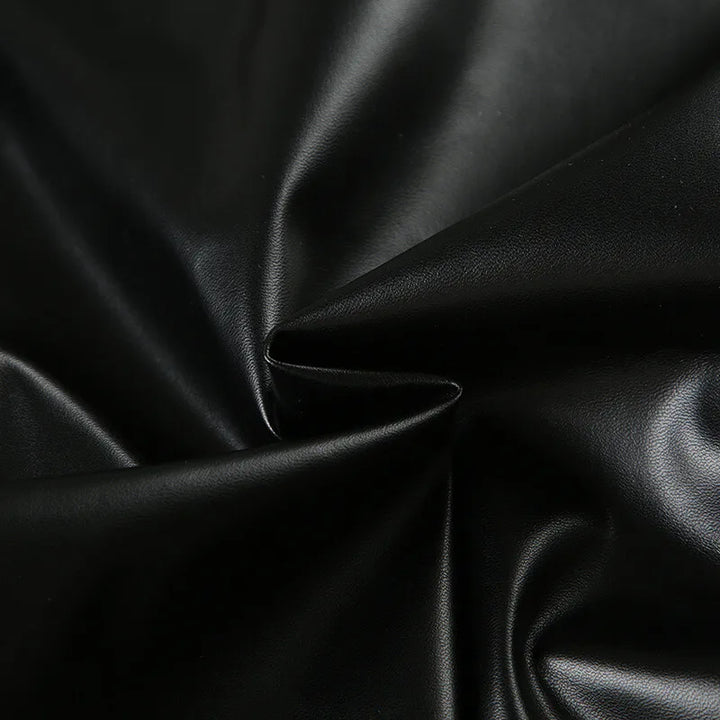 Faux leather top with asymmetrical design - Kami