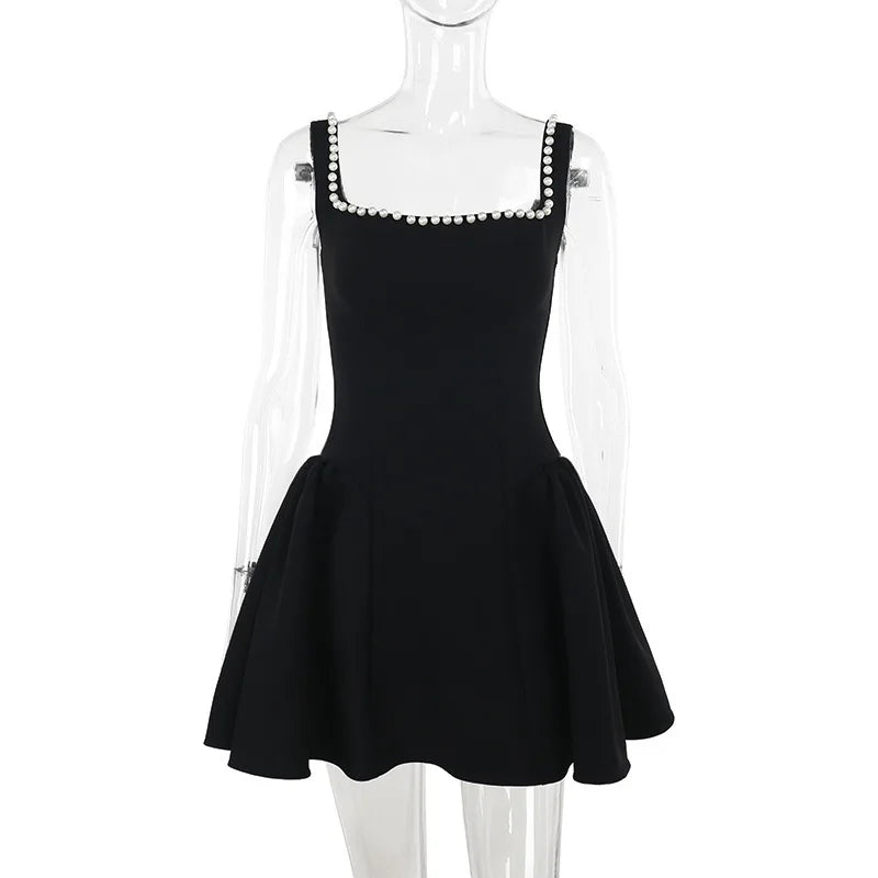 שמלת מיני בגזרת A בעיטור פנינים - פריס