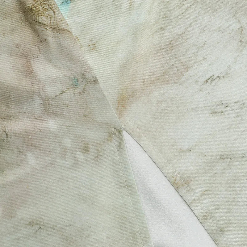 שמלת מקסי קולר בהדפס מיוחד גב פתוח - אורן