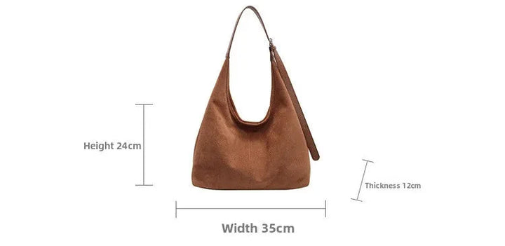 Suede bag with retro design