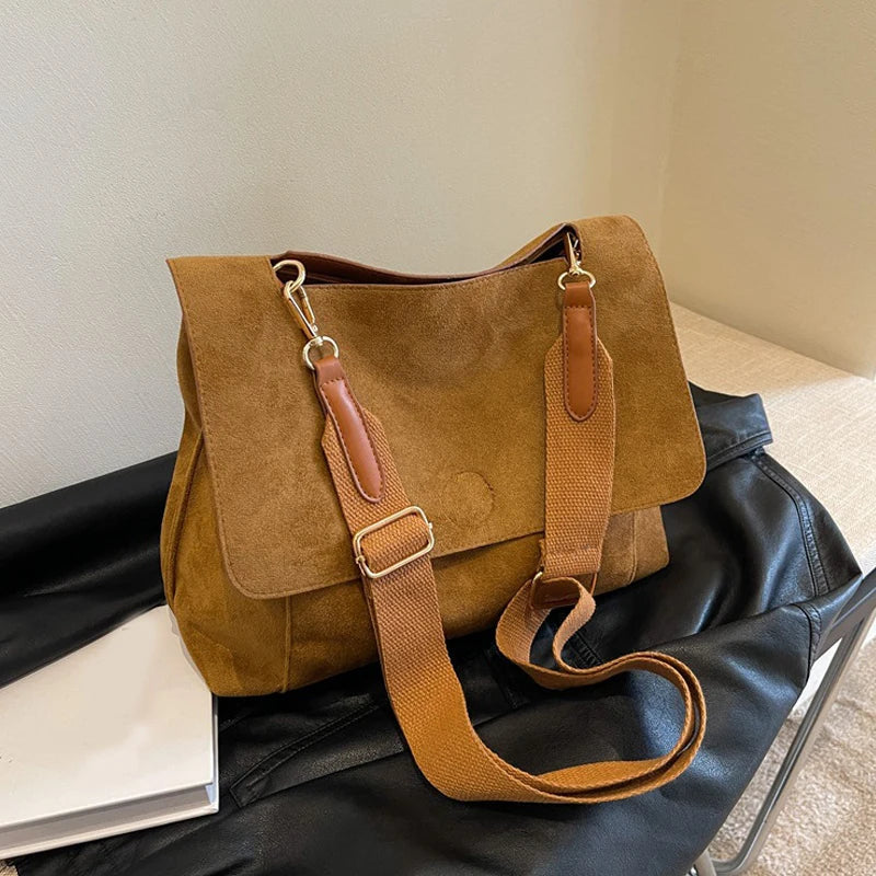 Suede bag with retro design