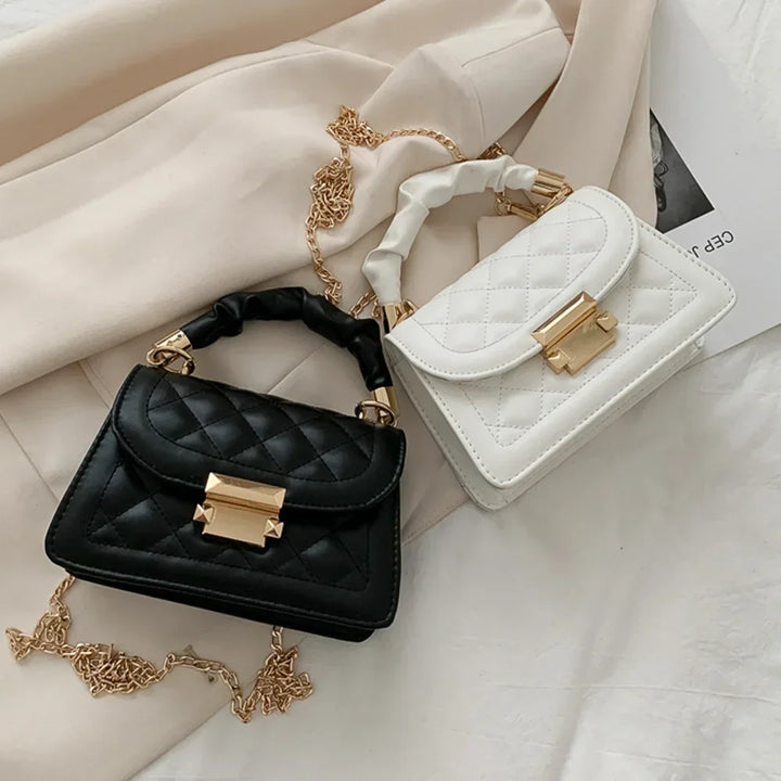 Faux leather handbag combined with chain strap