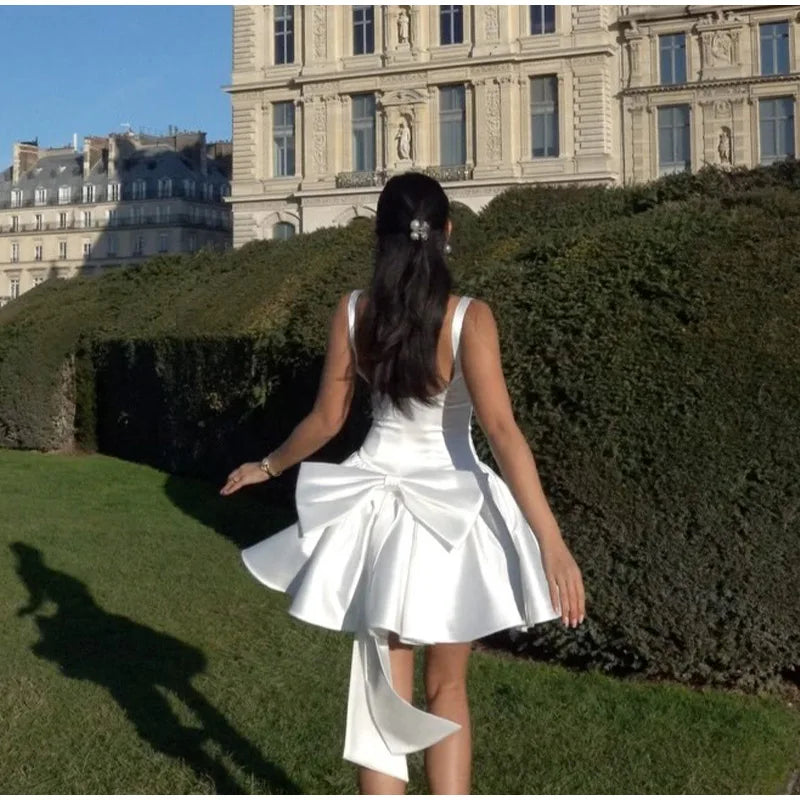 שמלת מיני סאטן גב פתוח בעיטור פפיון  - Reese