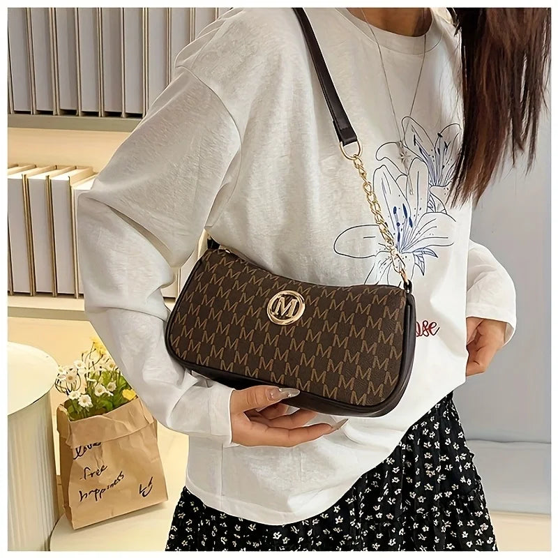 Handbag with M design