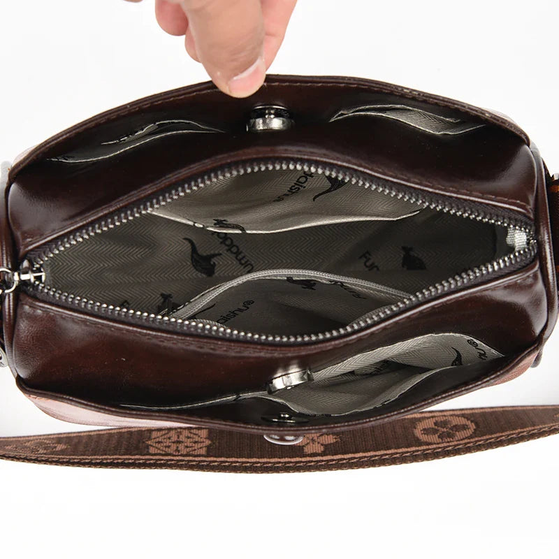 Faux leather bag with strap design