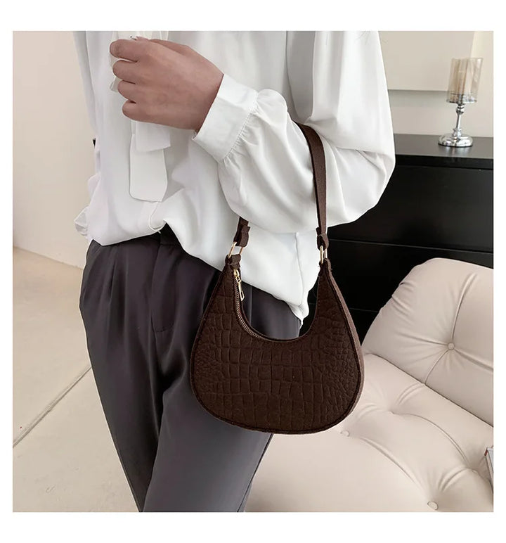 Faux leather bag with rough texture design