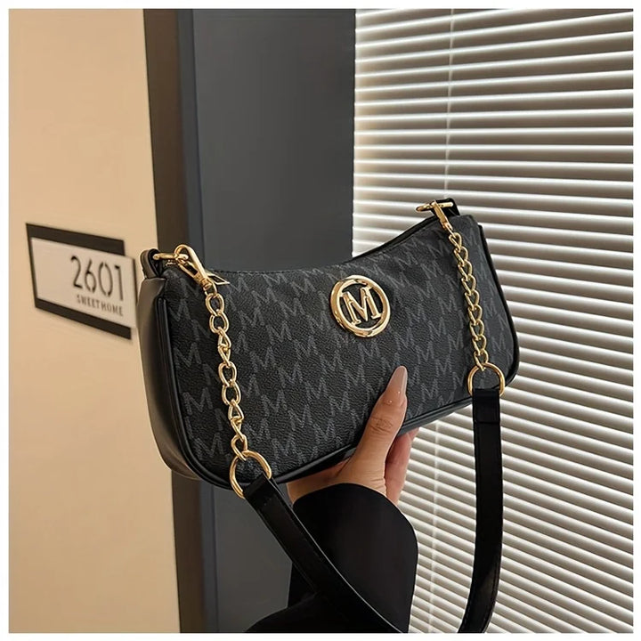 Handbag with M design