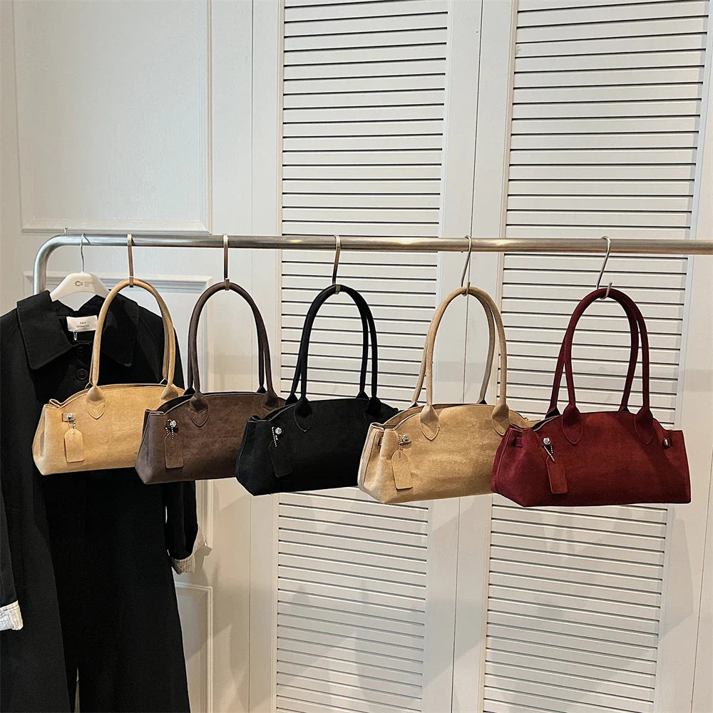 Suede bag with retro design