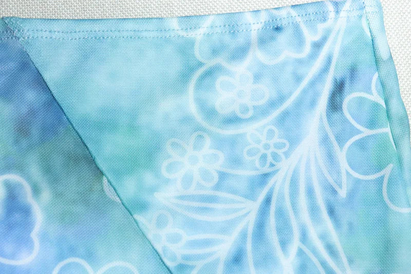 סט שני חלקים בהדפס טרופי טופ וחצאית מקסי מלמלה בעיצוב שסע - MAYA