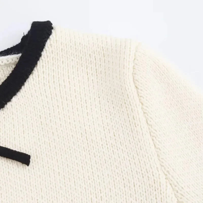 סוודר קשירות - מונה