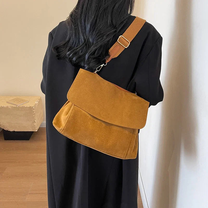 Suede bag with retro design