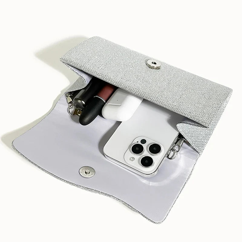 Clutch bag with sparkling studs and chain strap design