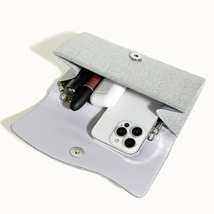 Clutch bag with sparkling studs and chain strap design