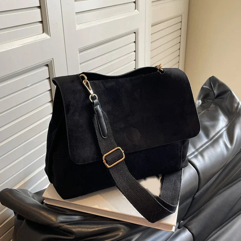 Suede bag with retro design
