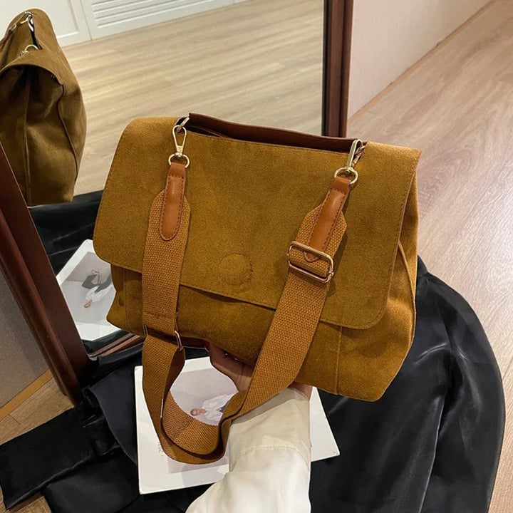 Suede bag with retro design