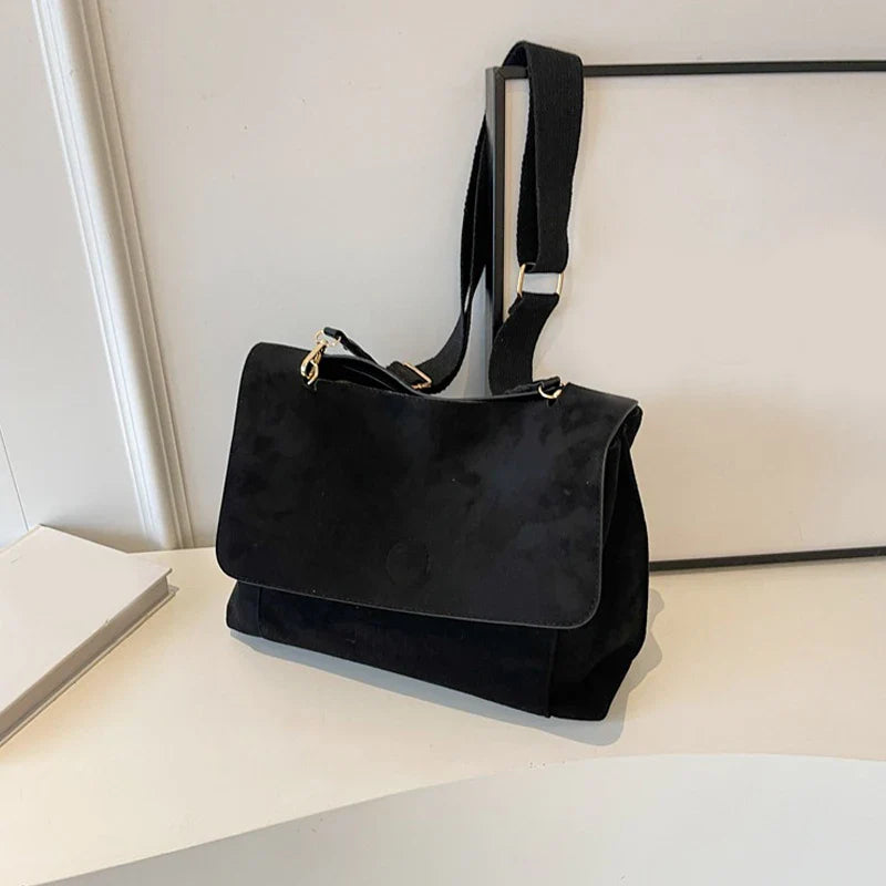 Suede bag with retro design