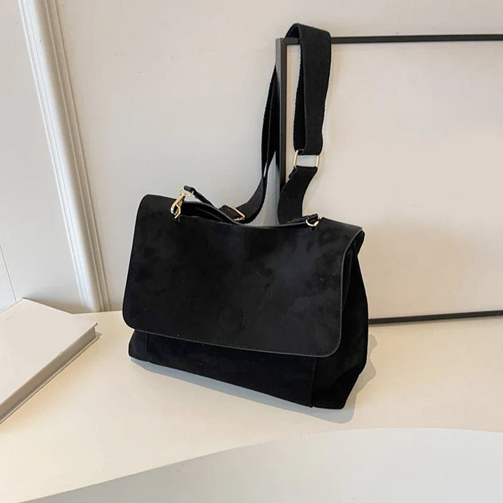 Suede bag with retro design