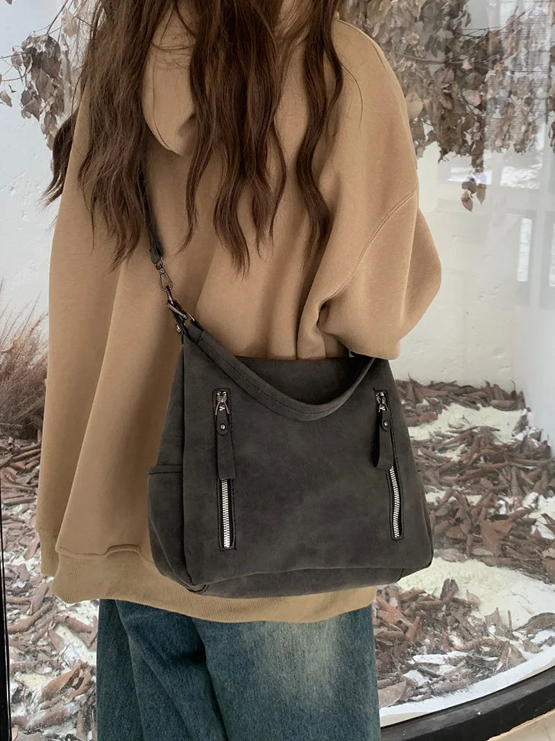 Bag with retro-style faux leather design