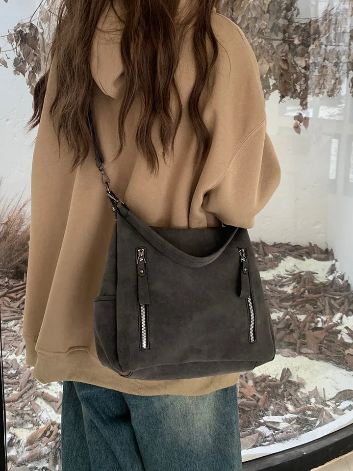 Bag with retro-style faux leather design