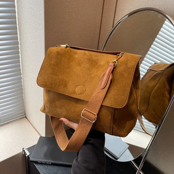 Suede bag with retro design