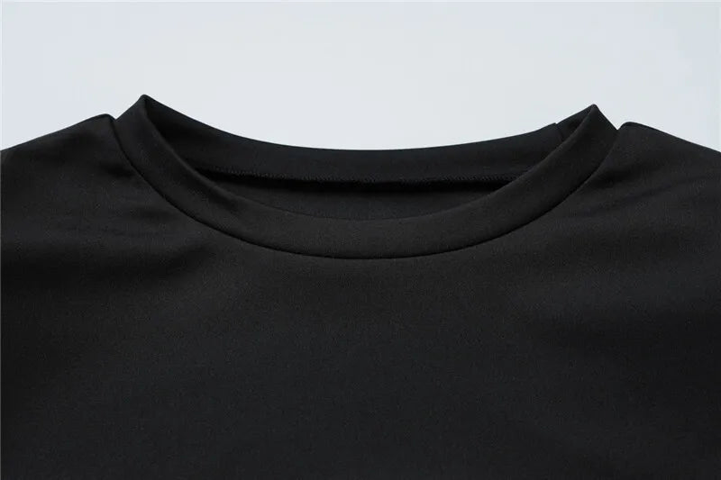 שמלת מיני בעיצוב מיוחד בעיטור אבזם ושובל - מורגן