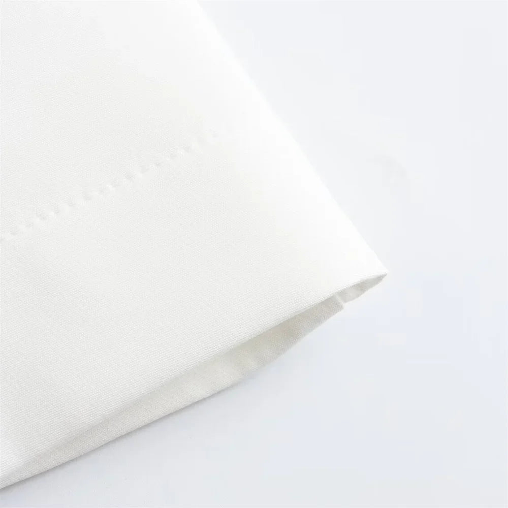 שמלת מיני מחויטת בעיצוב פתחים וחגורה בגב - דבי