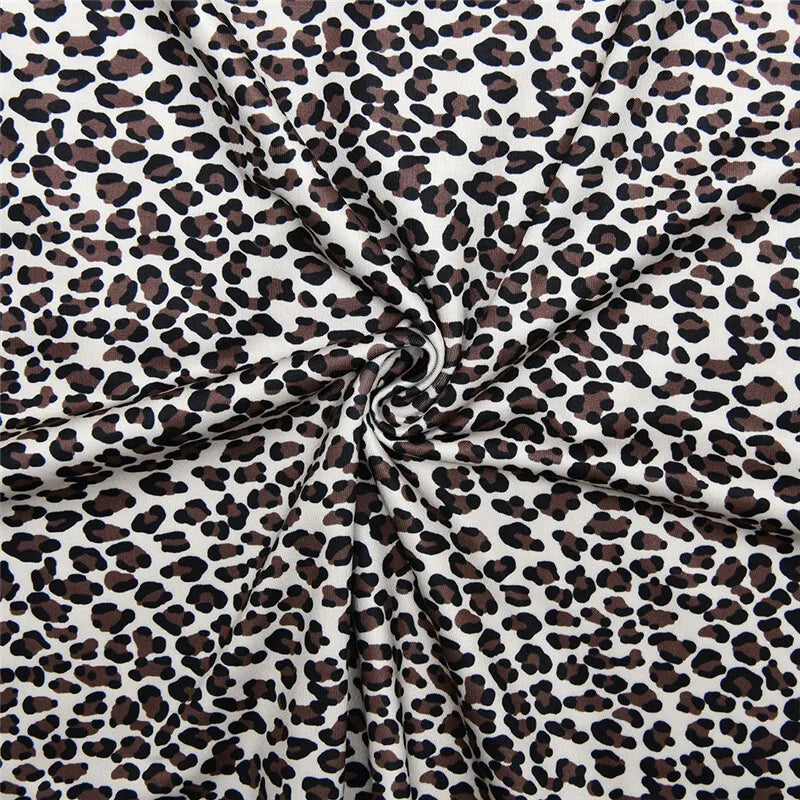 שמלת מיני מנומרת בעיצוב קשירה בצוואר וגב פתוח בעיטור תחרה - נלה