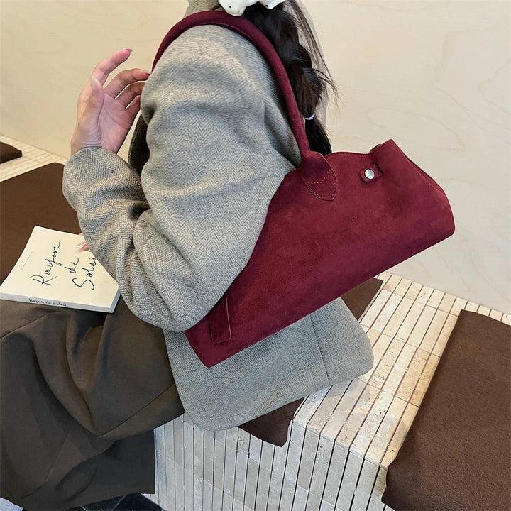 Suede bag with retro design