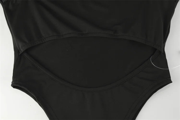 בגד גוף בעיצוב פתחים בד מחטב - Logan