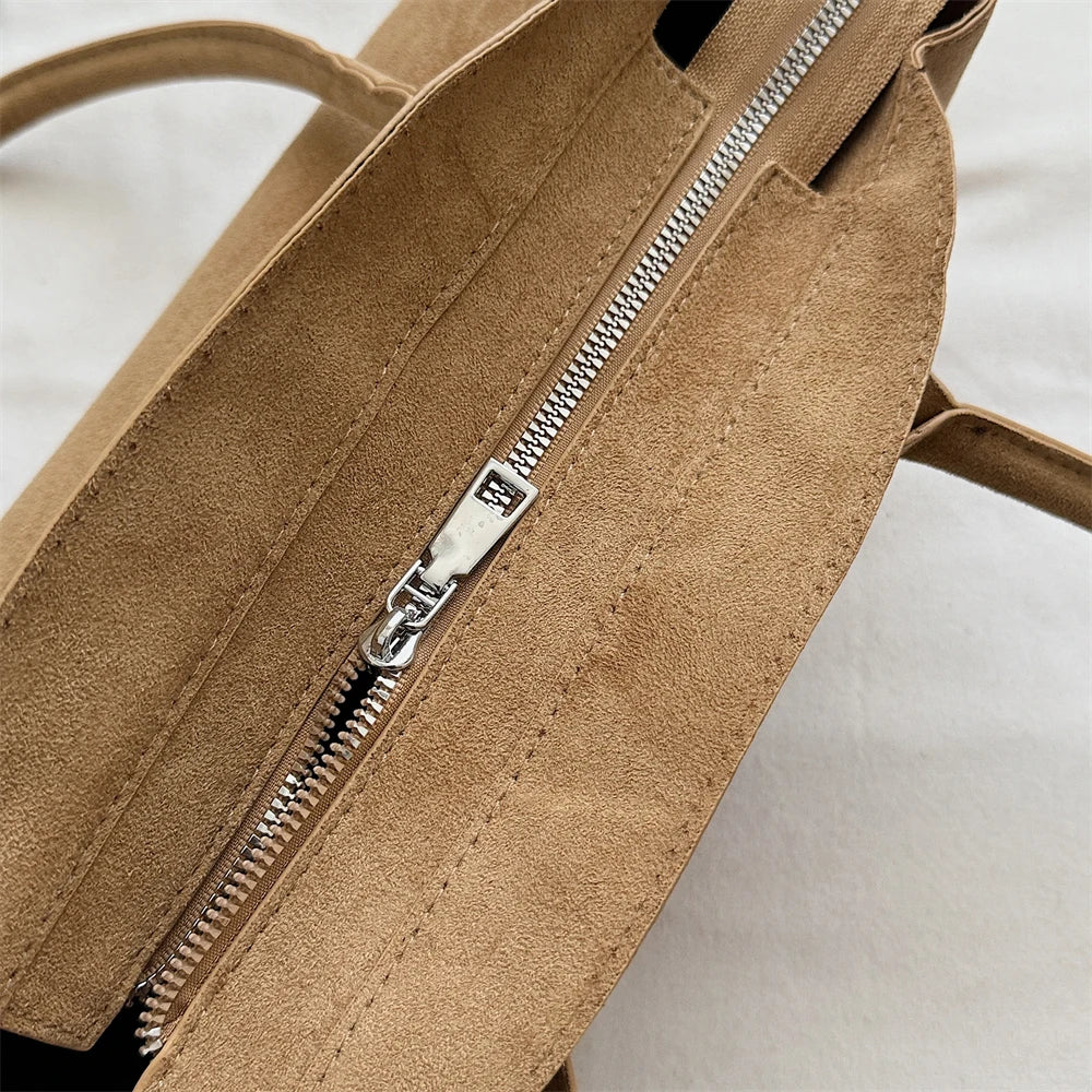 Suede bag with retro design