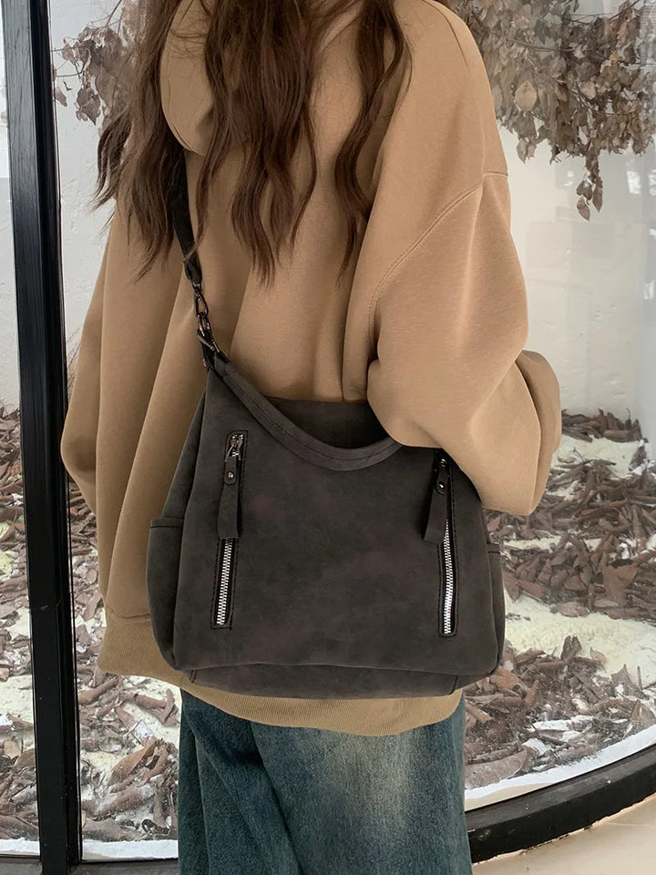 Bag with retro-style faux leather design