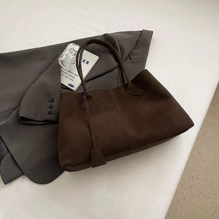 Suede bag with classic design