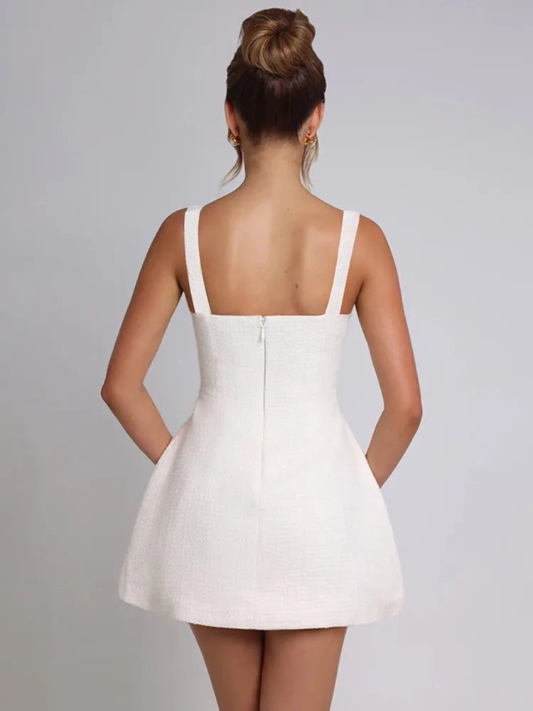 שמלת מיני בד ארוג בגזרת A בעיטור כיסים - מילי