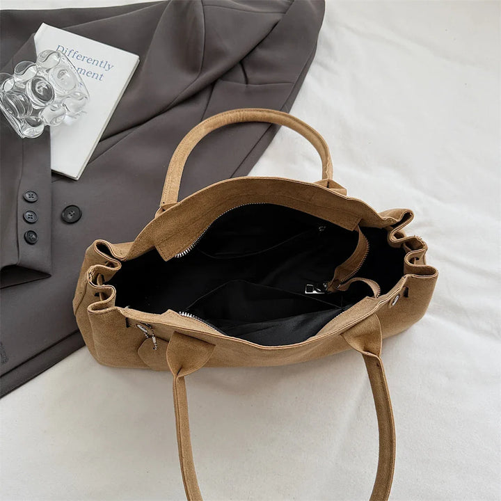 Suede bag with retro design