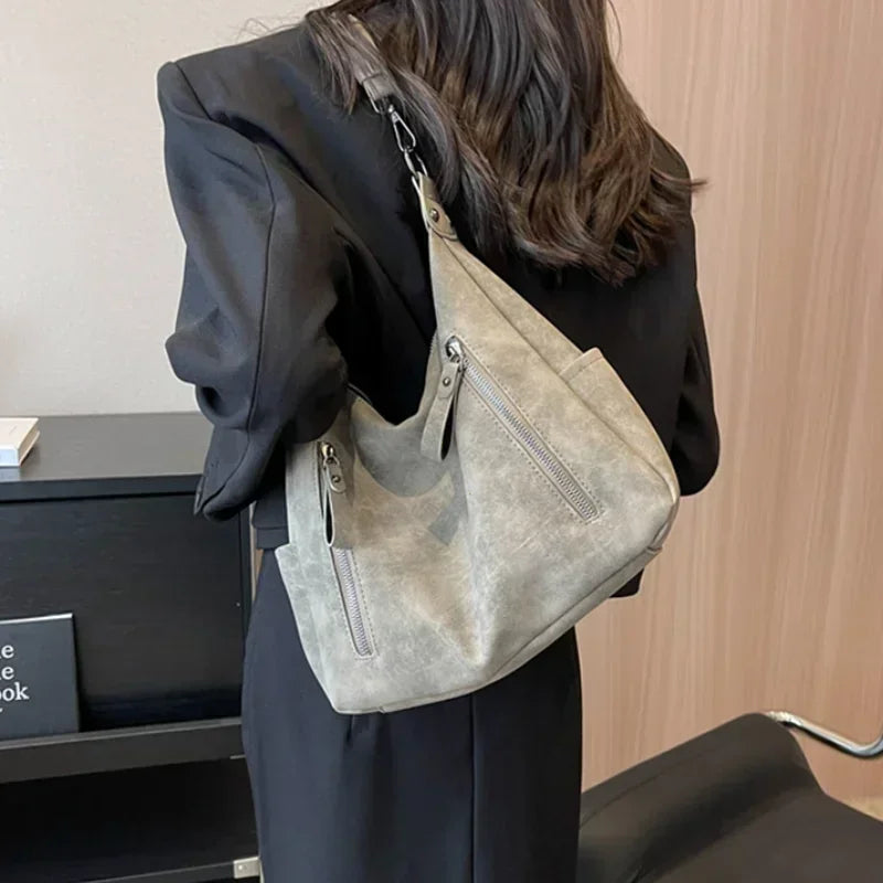 Bag with retro-style faux leather design