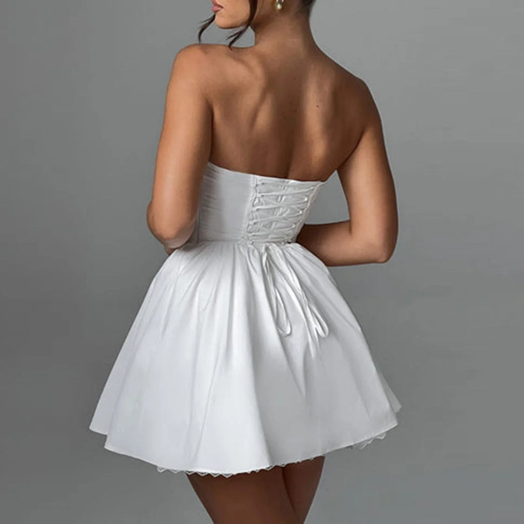 שמלת מיני בגזרת A קשירה בגב להצמדה במותן סטייל כפרי - Reya