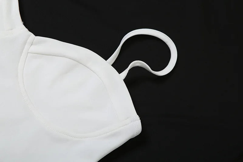 שמלת מיני בגזרת A כתפיות ספגטי בעיטור רקמת עלים ופרחים - שילה