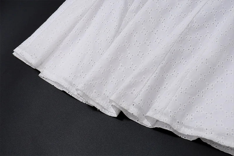 שמלת מיני שיפלי בגזרת A בעיטור איקסים בחזרה - Iliana