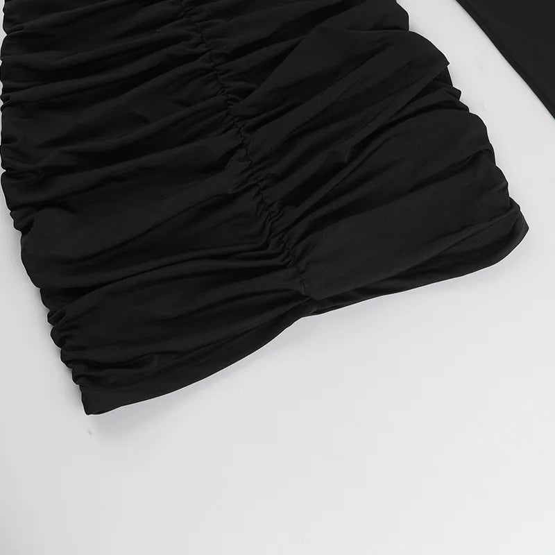 שמלת מיני צמודה בעיצוב פתחים ואבזמי זרקונים - מייס