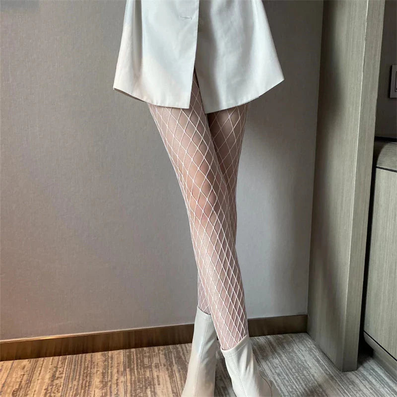 Tights in a variety of textures and shades: lace / hearts / bows / butterflies / mesh / sequins / stars