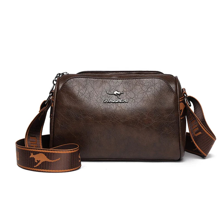 Faux leather bag with strap design