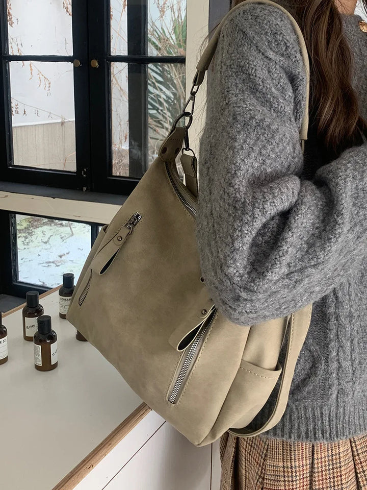Bag with retro-style faux leather design