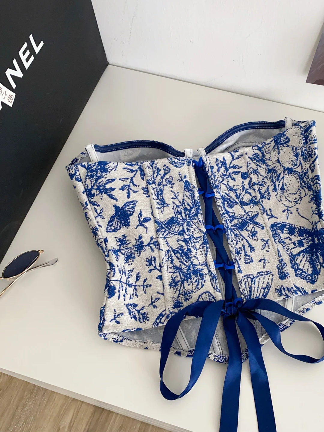 Corset with flower and butterfly design