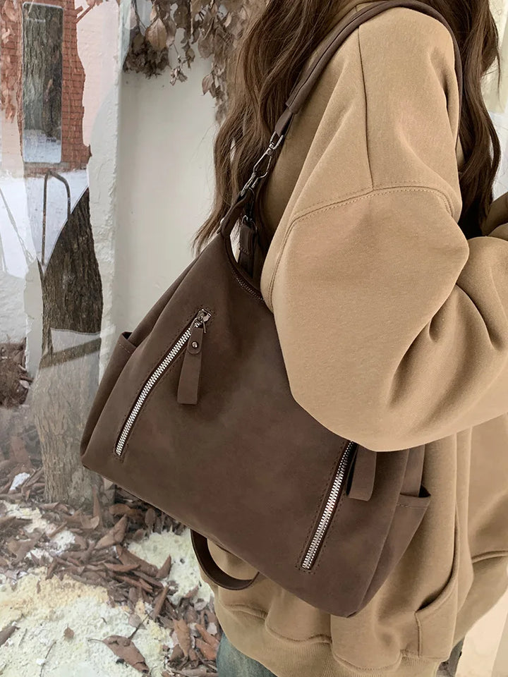 Bag with retro-style faux leather design