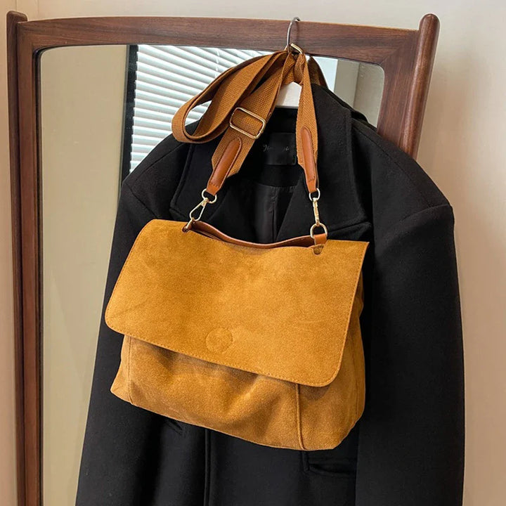Suede bag with retro design