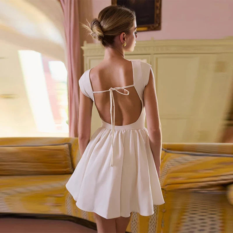 שמלת מיני בד פשתן בגזרת A גב פתוח - מרלין