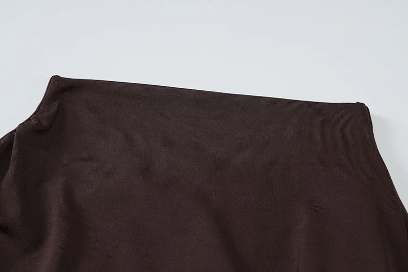 סט שני חלקים חולצת טופ בעיצוב קרוס גולף וחצאית מקסי בעיצוב קרוס בבטן - מורנה