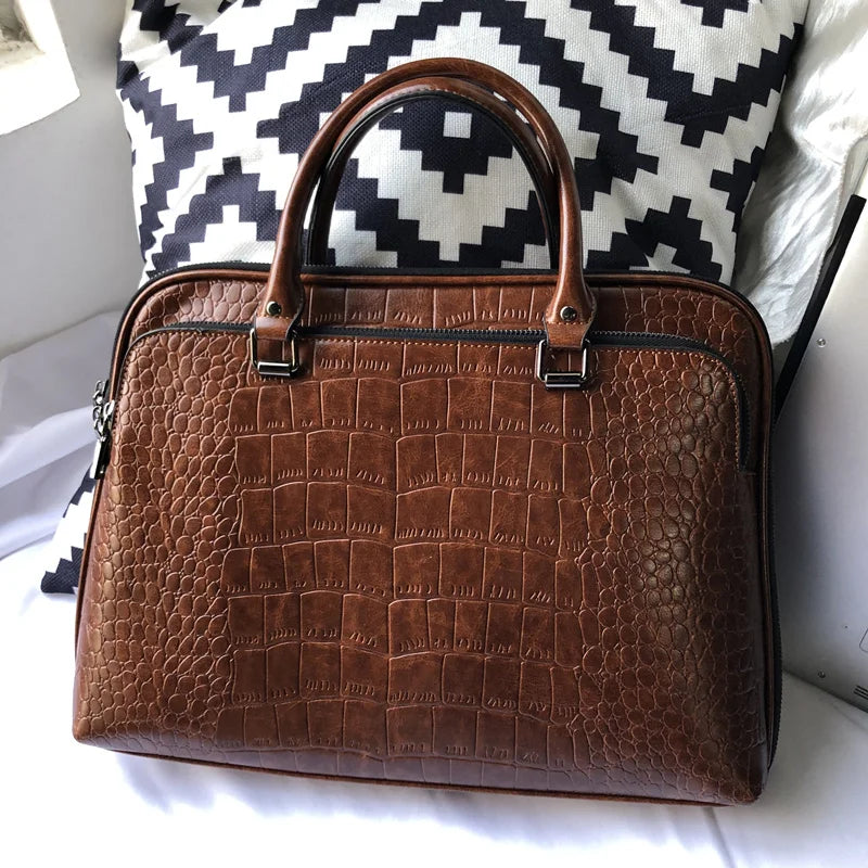 Leather bag with crocodile design